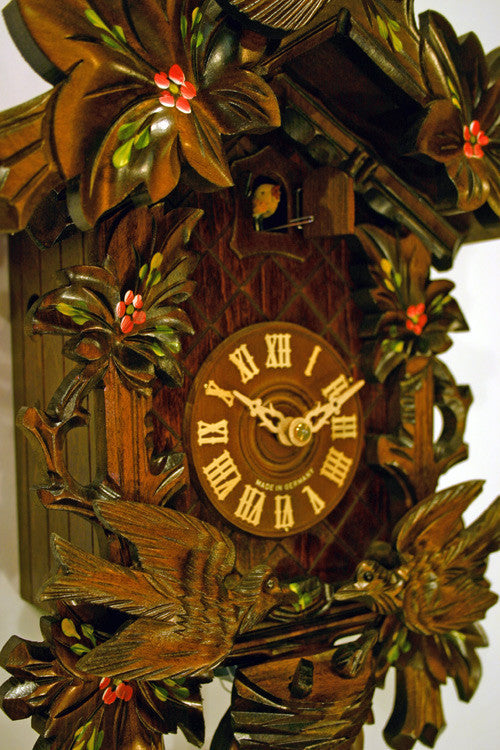 Eight Day Cuckoo Clock with Hand-painted Flowers, Leaves, and Animated Birds Feeding Baby Birds - 16 Inches Tall - OktoberfestHaus.com
 - 2